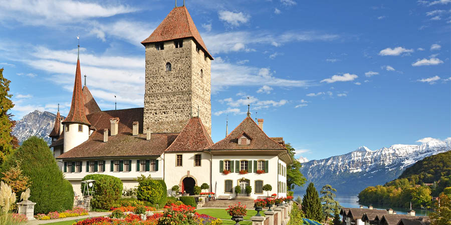 Savouring a private drink at lakeside Spiez Castle